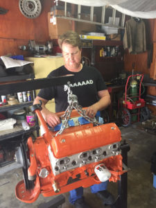 Taylor Brooks Working on an engine